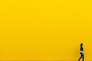 Woman with yellow - Photo by Rodion Kutsaev on Unsplash