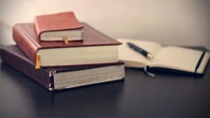 Stacked books - Photo by Mikhail Pavstyuk on Unsplash