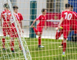 Footballers warming up - Image on Unsplash