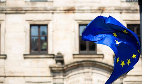 EU flag with building - Photo by Markus Spiske on Unsplash