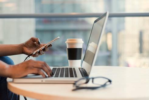 Laptop with phone - Image by Christina Morillo on Pexels