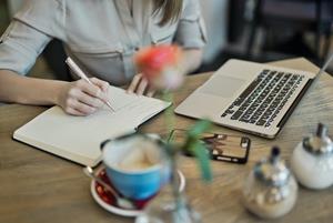 Woman writing - Photo by Judit Peter on Pexels