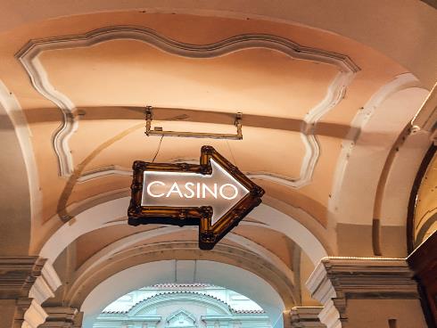 Casino sign - Photo by Jan Antonin Kolar on Unsplash