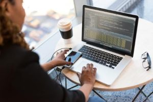 Woman with laptop and coffee - Image by Christina Morillo on Pexels