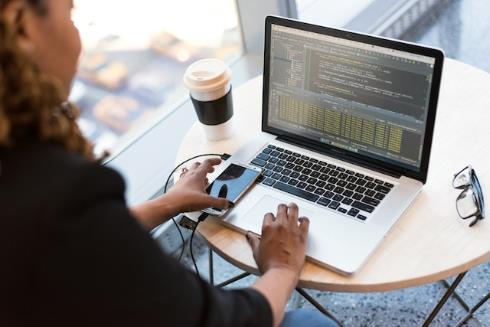 Woman with laptop and coffee - Image by Christina Morillo on Pexels