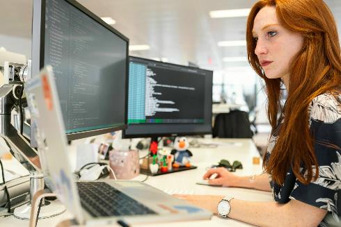 Computer woman with screens