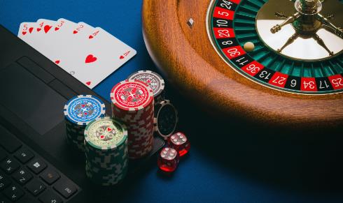 Gambling cards and chips - Photo by Aidan Howe on Unsplash